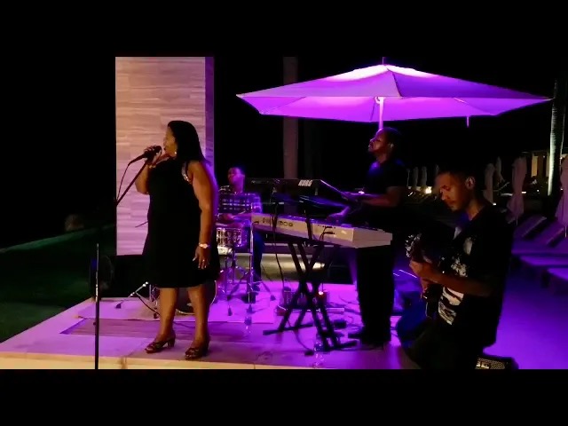 Queen B performing at a private dinner