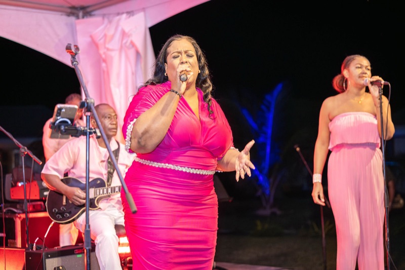 Queen B in pink with her band and backing vocalist at Malliouhana