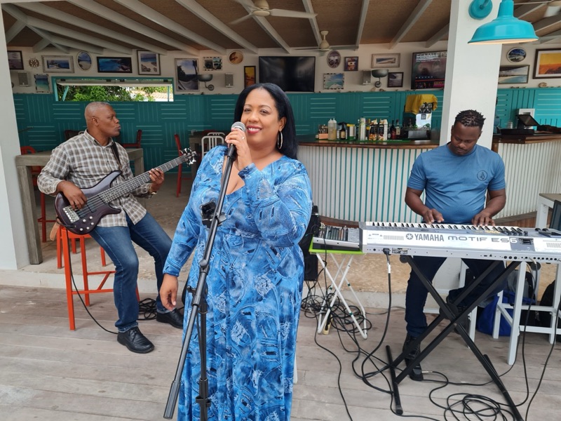 Queen B in blue with her band at Zemi Beach